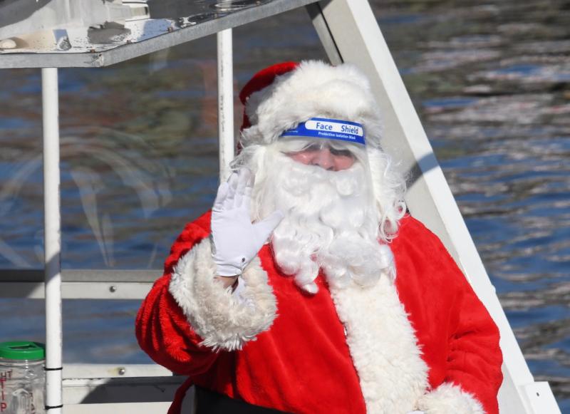 Santa Claus arrives by boat in Lewes Nov. 27 in the Lewes-Rehoboth Canal.